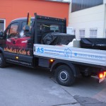 Winterdienstfahrzeug mit Heckstreuer